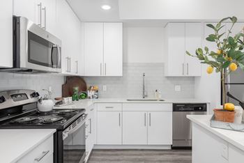 Glass tile backsplash in kitchen
